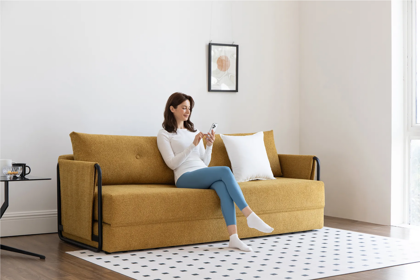 How to Make a Small Sofa Bed Look Like a Sofa (Not a “Guest Bed”)
