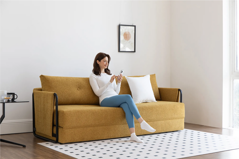 How to Make a Small Sofa Bed Look Like a Sofa (Not a “Guest Bed”)